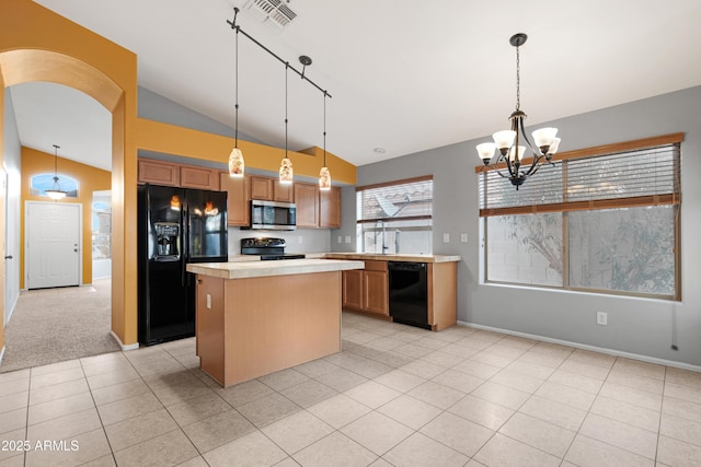 kitchen featuring visible vents, black appliances, arched walkways, light countertops, and a chandelier