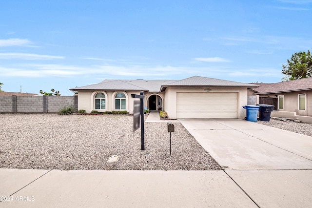 single story home with a garage