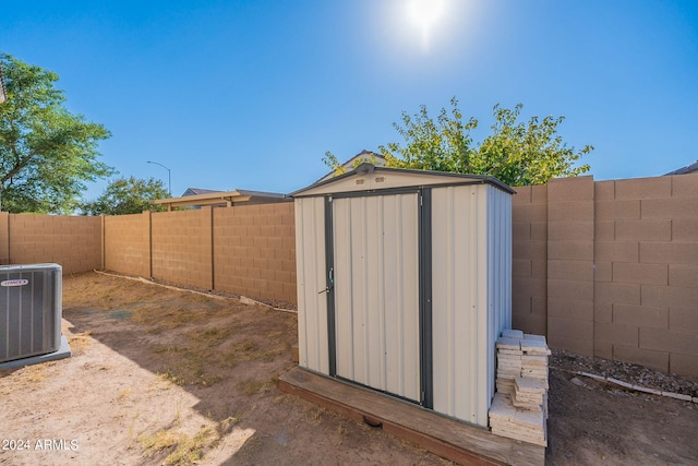 view of outbuilding featuring central AC unit