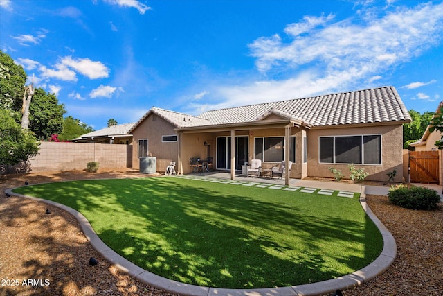 3350 E Rosemonte Dr, Phoenix, AZ 85050 - back of house with stucco siding, a tiled roof, and a patio