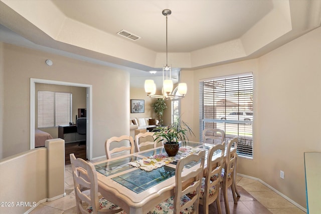 3350 E Rosemonte Dr, Phoenix, AZ 85050 - dining area with a chandelier, light tile patterned floors, a tray ceiling, and baseboards