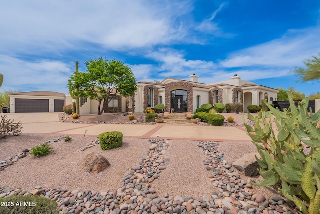 8502 E Santa Catalina Dr, Scottsdale, AZ 85255 - view of front of property featuring stucco siding, a chimney, and concrete driveway
