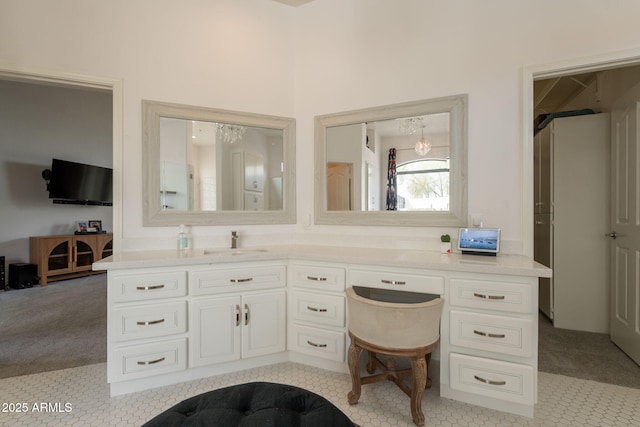 8502 E Santa Catalina Dr, Scottsdale, AZ 85255 - bathroom featuring a chandelier and vanity