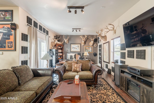 8502 E Santa Catalina Dr, Scottsdale, AZ 85255 - living area featuring wood finished floors, plenty of natural light, rail lighting, and baseboards