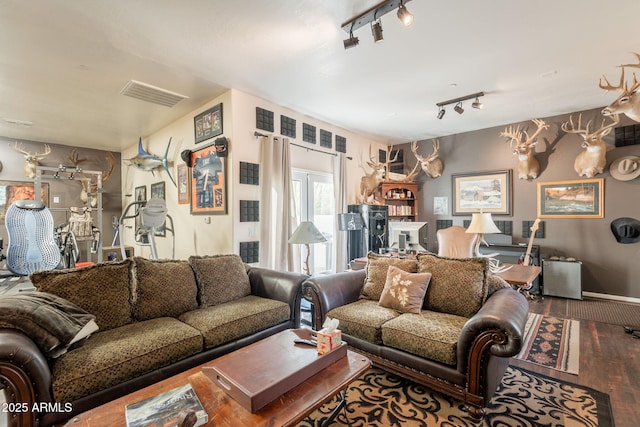8502 E Santa Catalina Dr, Scottsdale, AZ 85255 - living room featuring wood-type flooring and track lighting