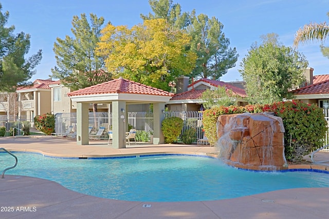 view of pool featuring a gazebo and pool water feature