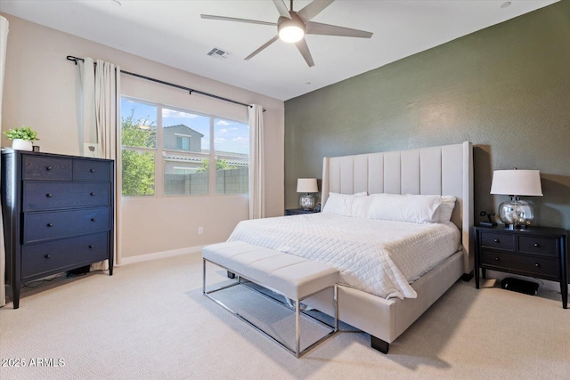 1895 N 141st Ave, Goodyear, AZ 85395 - bedroom featuring light carpet, baseboards, and ceiling fan