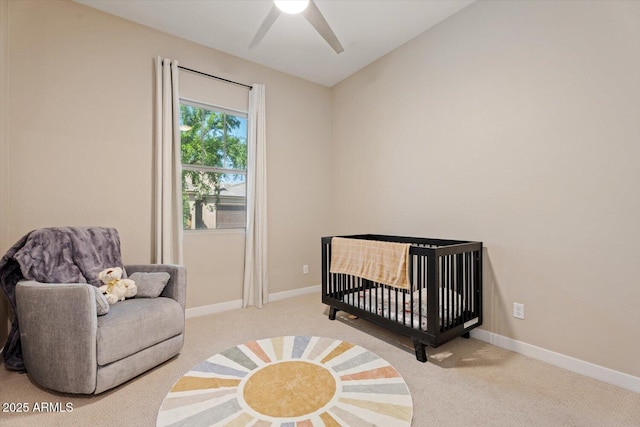 1895 N 141st Ave, Goodyear, AZ 85395 - bedroom with carpet flooring, a nursery area, baseboards, lofted ceiling, and ceiling fan
