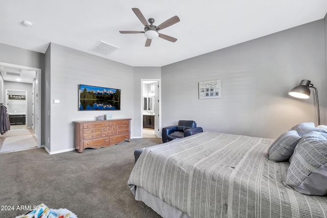 bedroom with carpet, ensuite bathroom, and ceiling fan