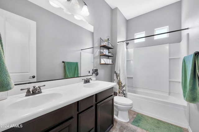 full bathroom featuring vanity, toilet, and shower / bathtub combination with curtain