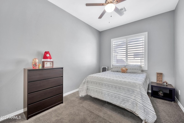 bedroom with carpet flooring, ceiling fan, and vaulted ceiling