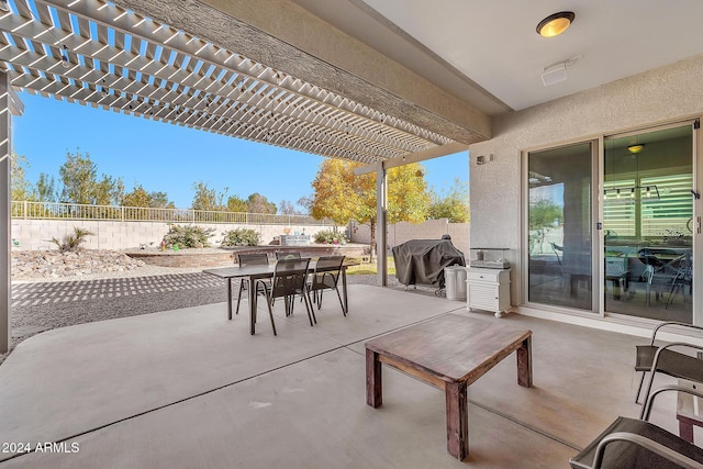 view of patio / terrace with a pergola and grilling area