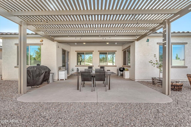 view of patio with a pergola and grilling area