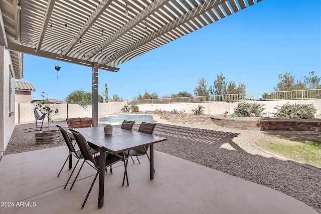 view of patio with a pergola and a fenced in pool