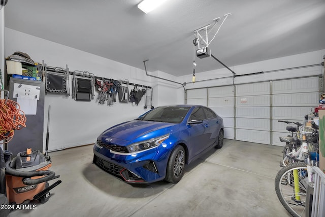 garage featuring a garage door opener