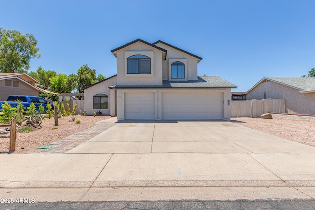 4933 E Downing St, Mesa, AZ 85205 - view of front of property featuring stucco siding, a garage, and driveway