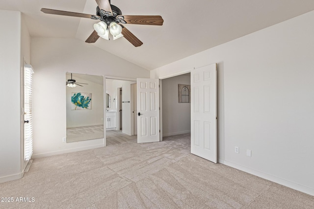 4933 E Downing St, Mesa, AZ 85205 - unfurnished bedroom featuring carpet flooring, vaulted ceiling, ensuite bath, and a ceiling fan