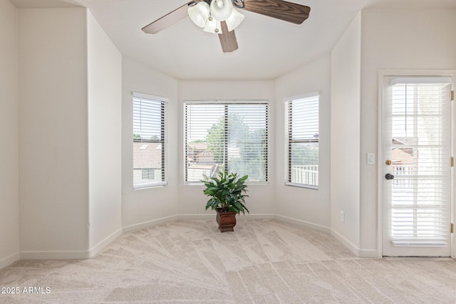 4933 E Downing St, Mesa, AZ 85205 - carpeted spare room featuring a ceiling fan and baseboards