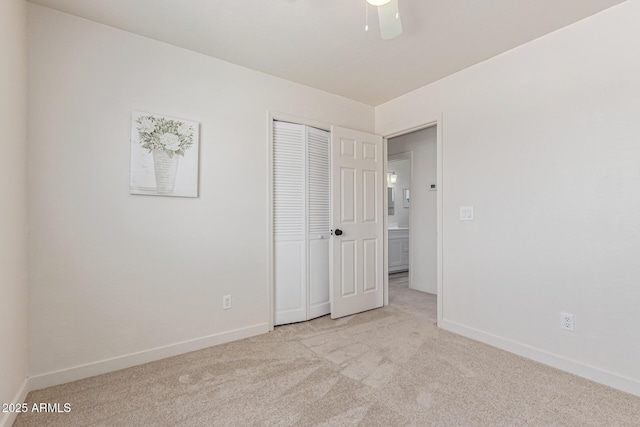 4933 E Downing St, Mesa, AZ 85205 - unfurnished bedroom featuring carpet floors, a closet, and a ceiling fan
