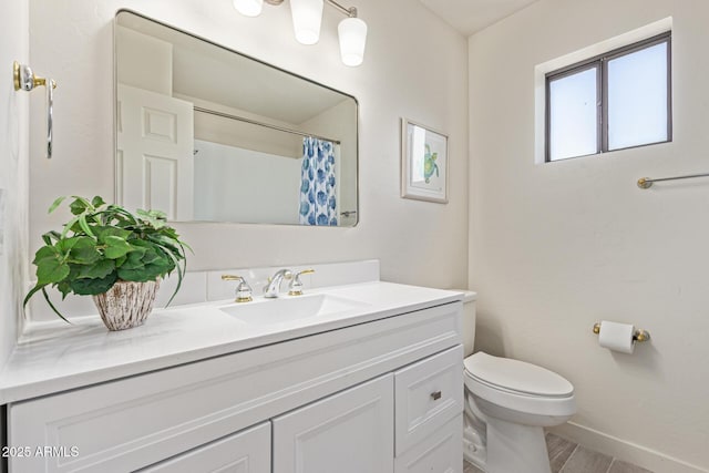 4933 E Downing St, Mesa, AZ 85205 - full bath with vanity, wood finished floors, and a shower with curtain