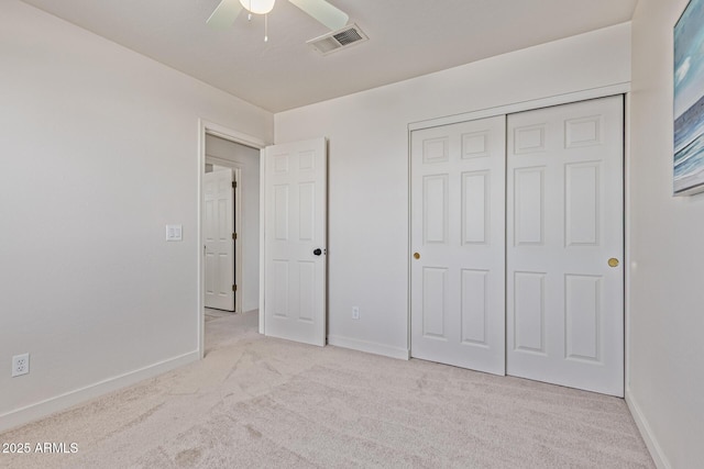 4933 E Downing St, Mesa, AZ 85205 - unfurnished bedroom with carpet floors, a closet, and a ceiling fan
