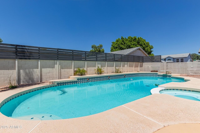 4933 E Downing St, Mesa, AZ 85205 - view of swimming pool with a fenced backyard and a pool with connected hot tub