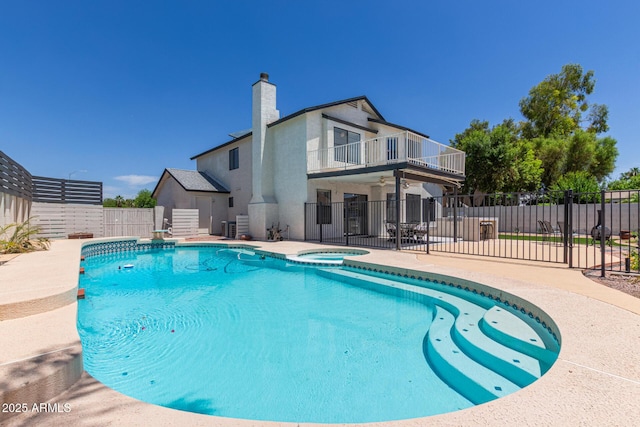 4933 E Downing St, Mesa, AZ 85205 - view of pool featuring ceiling fan, a patio, and a pool with connected hot tub