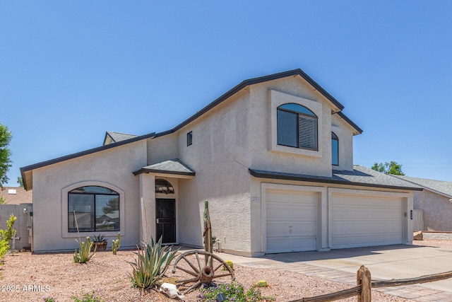 4933 E Downing St, Mesa, AZ 85205 - french country inspired facade with a garage, stucco siding, concrete driveway, and roof with shingles