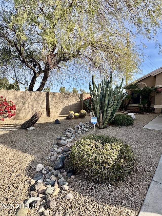 view of yard with fence