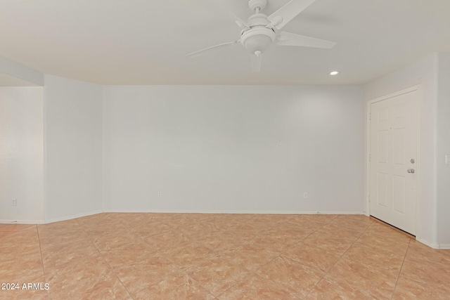 unfurnished room with ceiling fan