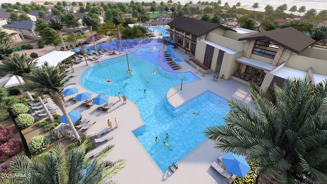 pool featuring fence and a patio area