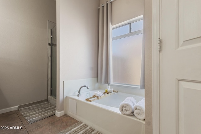 7736 W Tumblewood Dr, Peoria, AZ 85382 - full bath featuring a bath, tile patterned flooring, and a stall shower
