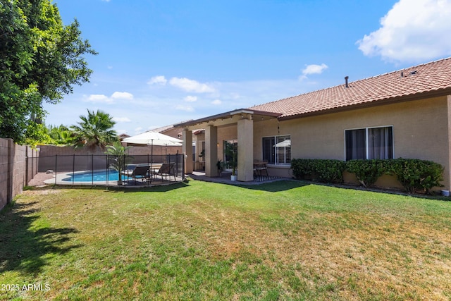 7736 W Tumblewood Dr, Peoria, AZ 85382 - fenced backyard featuring a patio