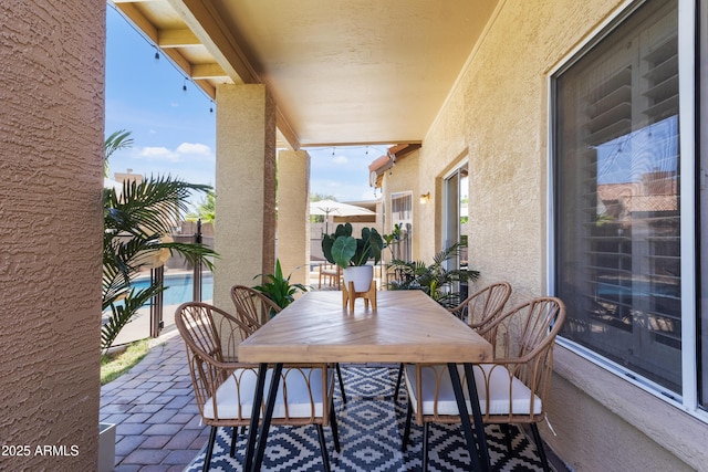 7736 W Tumblewood Dr, Peoria, AZ 85382 - view of patio featuring an outdoor pool and outdoor dining area