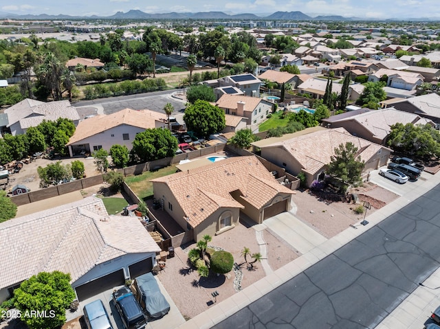 7736 W Tumblewood Dr, Peoria, AZ 85382 - aerial perspective of suburban area featuring a mountainous background