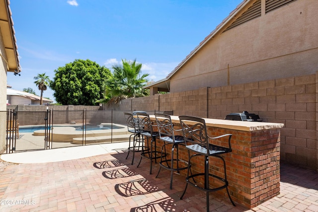7736 W Tumblewood Dr, Peoria, AZ 85382 - fenced backyard with a patio area