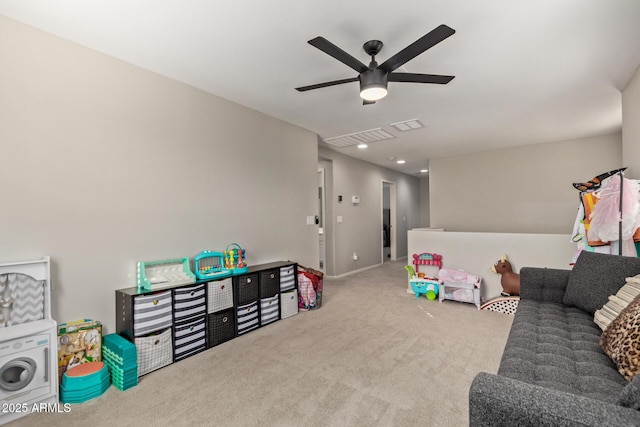 rec room featuring a ceiling fan, carpet flooring, and visible vents