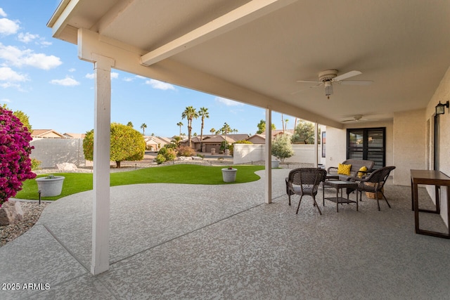 view of patio / terrace featuring ceiling fan