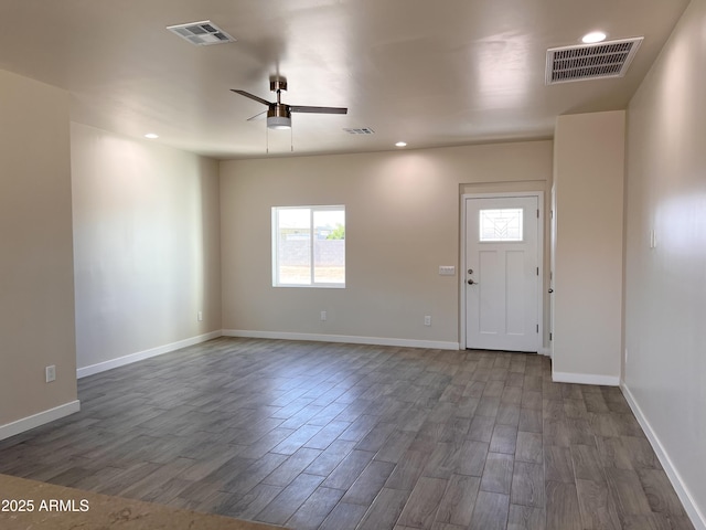 interior space featuring wood finished floors and visible vents