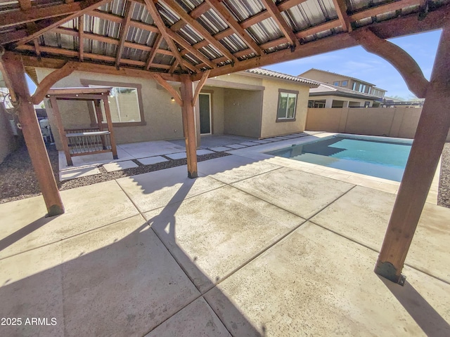 view of swimming pool featuring a gazebo, a fenced in pool, fence, and a patio area