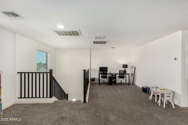 office featuring carpet floors and visible vents