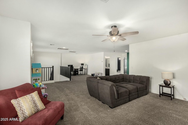 carpeted living room with ceiling fan, visible vents, and baseboards