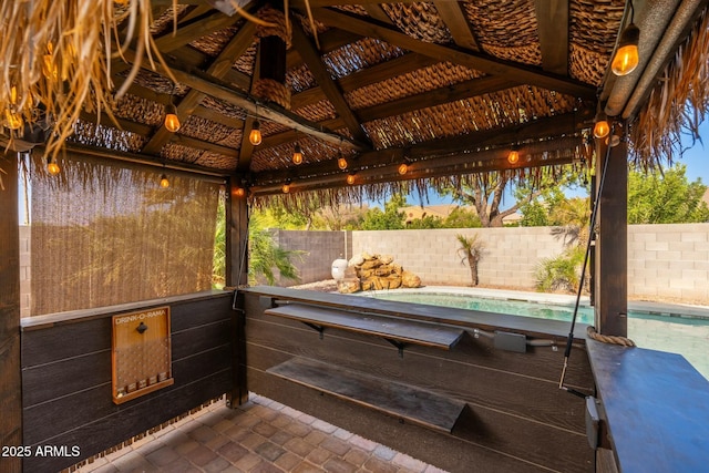 view of patio / terrace featuring a fenced in pool