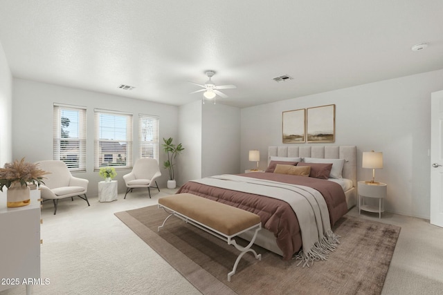 bedroom with light colored carpet and ceiling fan