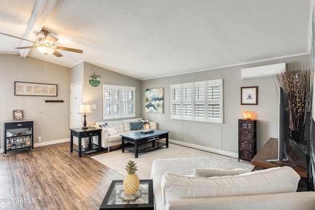 living room featuring a wall mounted air conditioner, vaulted ceiling with beams, a textured ceiling, and wood finished floors