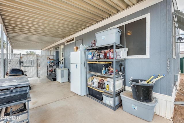 view of patio / terrace with a gate and fence