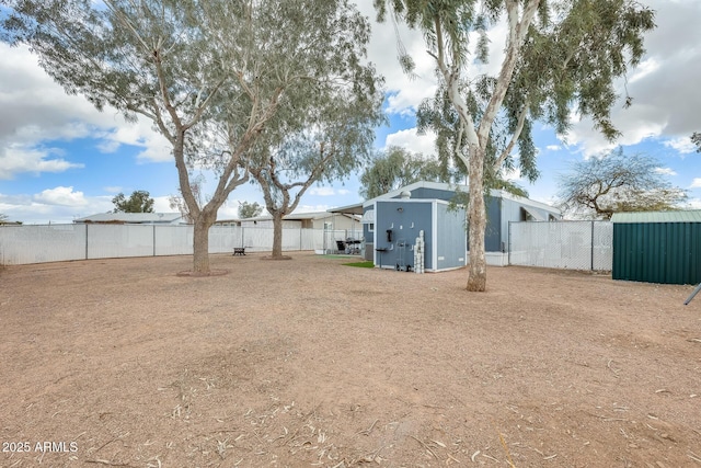 view of yard with a fenced backyard