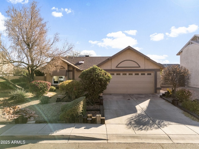 ranch-style home with a garage