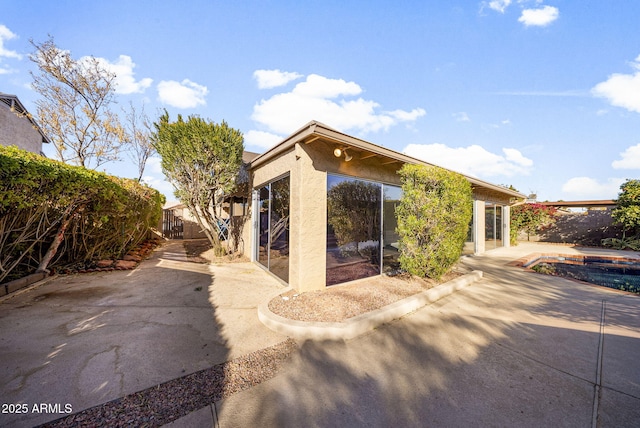 rear view of house with a patio area