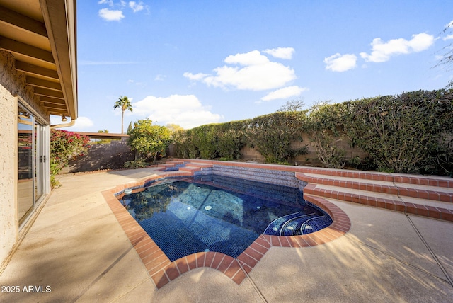 view of swimming pool featuring a patio